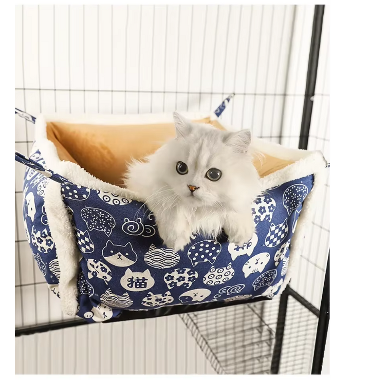Comfortable cat cave with a vibrant paw print pattern, providing a secure and cozy pet house.