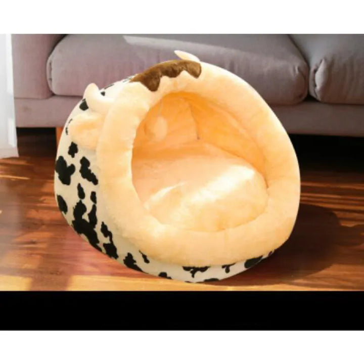 Unisex cat bed shaped like a spotted cow, a cute and comfortable pet accessory for house decor