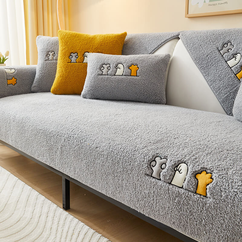 Pet-friendly sofa protector, cozy sherpa fleece with cute cat paw anti-slip backing