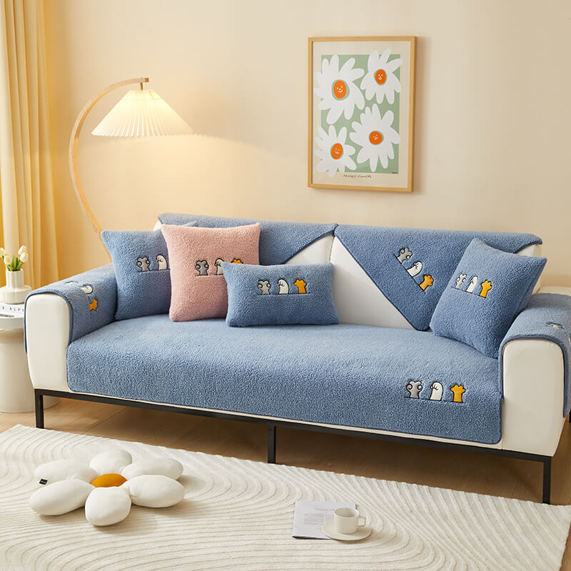 Stylish cat paw sherpa fleece anti-slip couch cover, enhancing home decor and protecting furniture