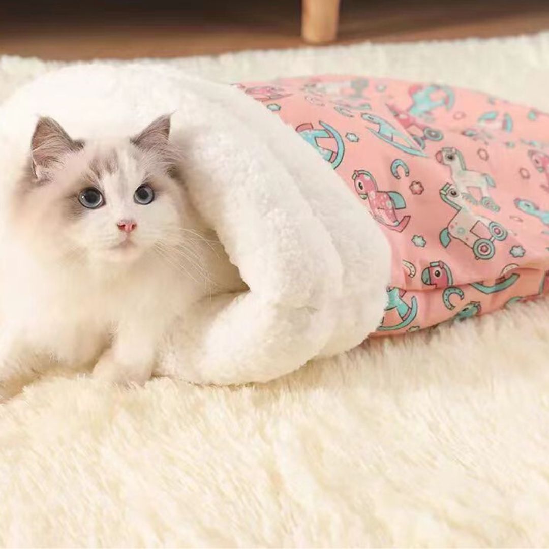 Cozy cat sleeping bag pet bed, soft plush cave for indoor cats, washable.