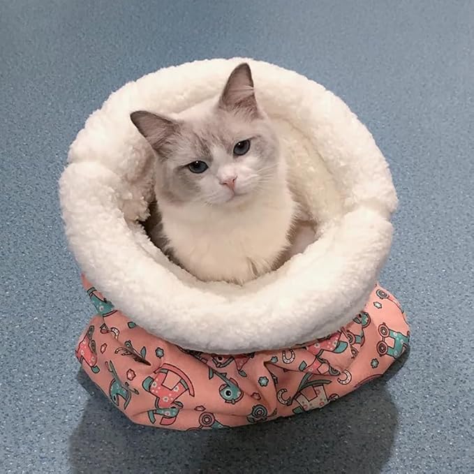 Warm cat sleeping bag pet bed, plush material for comfort, ideal for small cats.