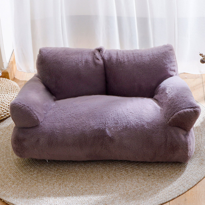 Beige elevated pet sofa bed for cats, featuring a plush, cozy design and easy-clean removable cover.