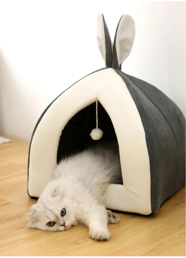 Soft rose cat bed, a cozy cave for felines, complete with an engaging integrated play ball