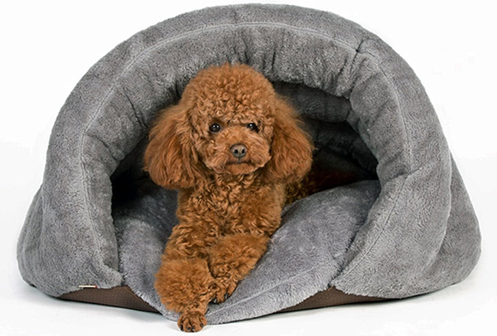 Soft pet cave dog bed in an indoor setting, providing animal comfort and relaxation