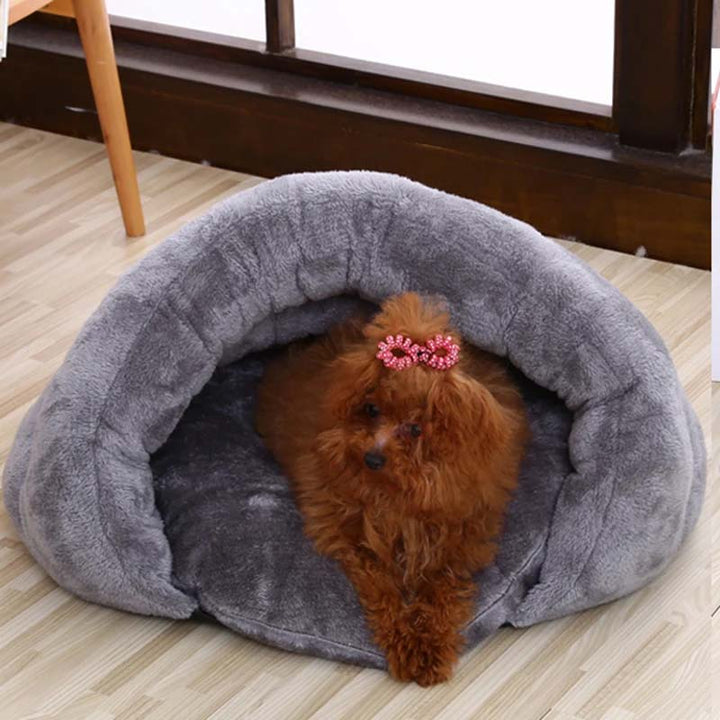 Circular Cozy Cave dog bed with soft plush interior, perfect for pet relaxation