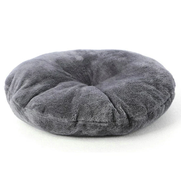 Deep-cushioned Cozy Cave dog bed, ideal for pets seeking a secure and cozy space