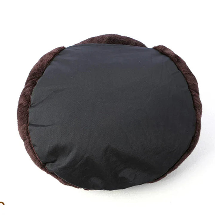 Plush pet cave bed for dogs and cats, offering a cozy and relaxing retreat within the home