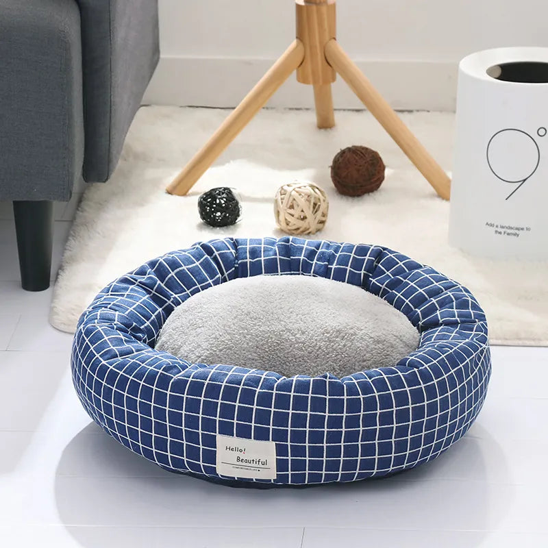 Soft plush pet bed, checkered design, offering a warm and comfortable spot for your dog or cat.