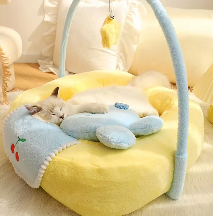 Cozy duck-shaped cat bed in soft yellow fabric, perfect for cat comfort and relaxation.