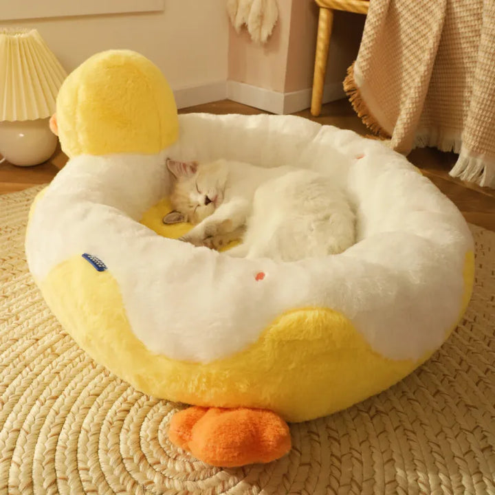 Adorable duck pet bed for cats, providing a plush and warm cat accessory for sleep.