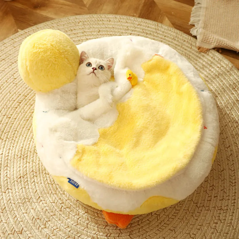 Yellow duck cat bed, a soft pet bed designed for ultimate cat comfort and relaxation.