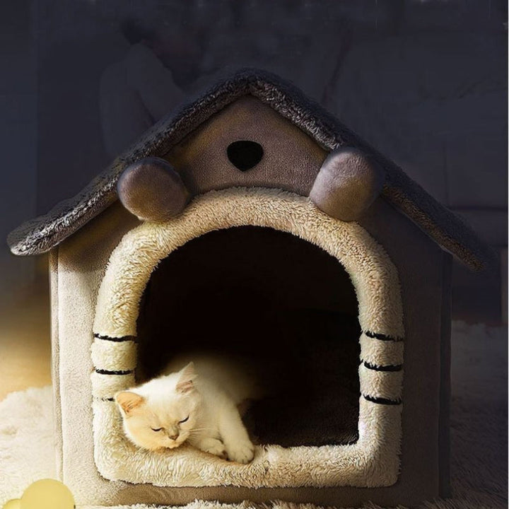 Feline accessories: a new cozy cat house with a soft, plush interior for ultimate pet comfort.