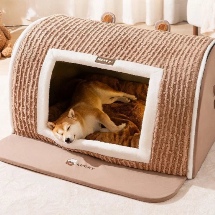 Indoor pet house bed in a neutral tone, providing a warm and enclosed cave for small dogs. Easy to clean.