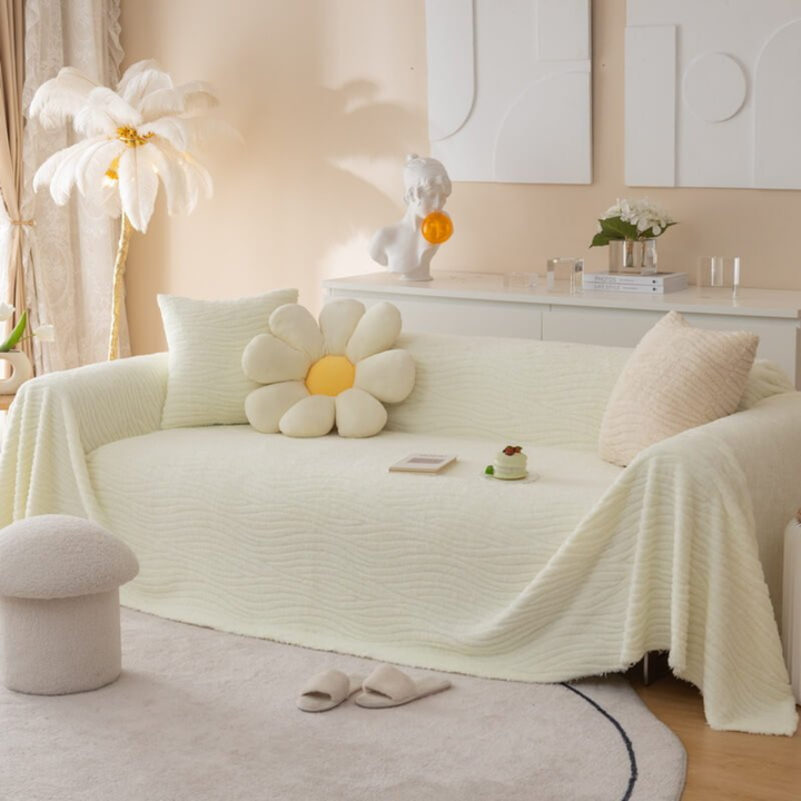Full-view of a living room with a chenille sofa cover, enhancing boho decor while protecting furniture.