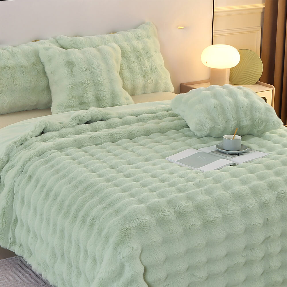Plush faux rabbit fur throw, pet friendly bedding, and soft decorative pillowcase