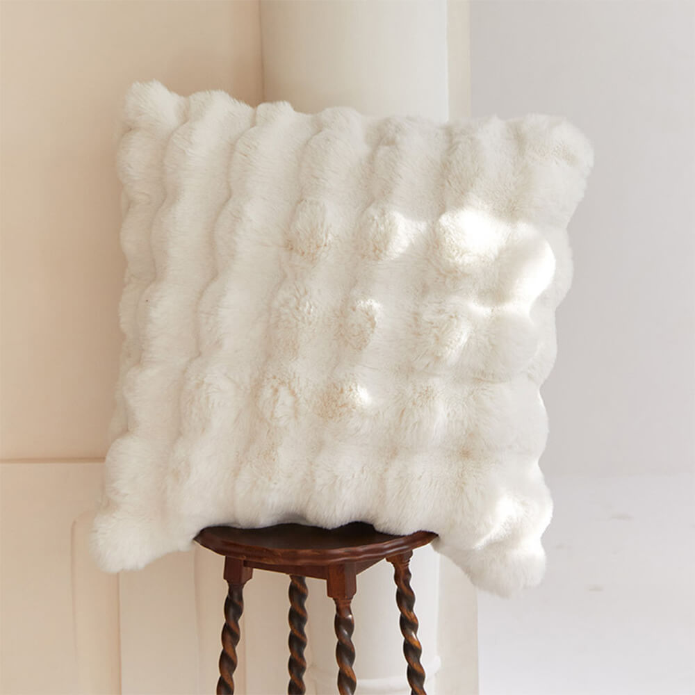 Warm faux rabbit fur blanket for bed or sofa, accompanied by a matching pillowcase