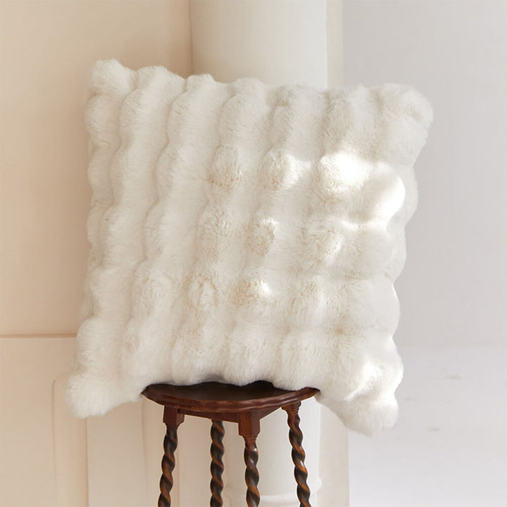 Warm faux rabbit fur blanket for bed or sofa, accompanied by a matching pillowcase