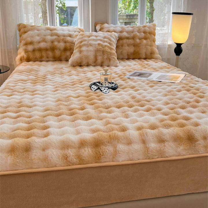 Cozy faux rabbit fur fitted sheet and two pillowcases in a luxurious bedroom setting, full view.