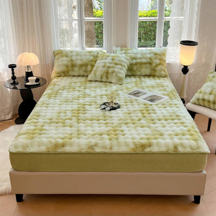 Complete bedding set with cozy faux rabbit fur fitted sheet and two standard pillowcases.