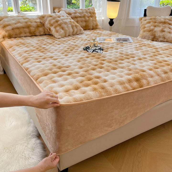 Luxurious faux fur mattress cover and pillow shams, providing ultimate comfort and warmth.