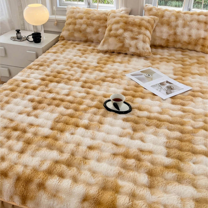 Closeup of the soft texture on a faux rabbit fur pillowcase, part of a cozy bedding set.