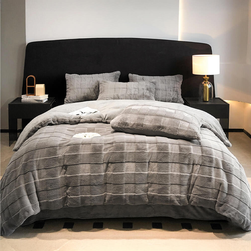 Full view of grey faux rabbit fur milk velvet sheet set, soft textures, luxury bedding