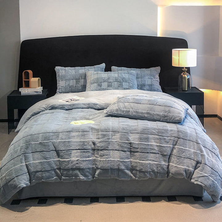 Bedroom featuring a luxurious brown faux rabbit fur milk velvet sheet set, inviting bed