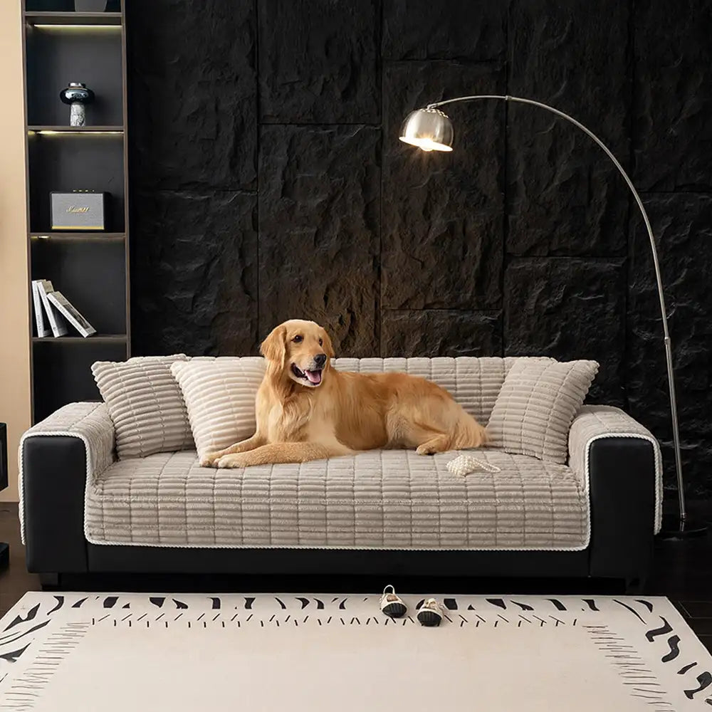 Cozy flannel non-slip sofa cover in a neutral color, perfect for pet-friendly homes.