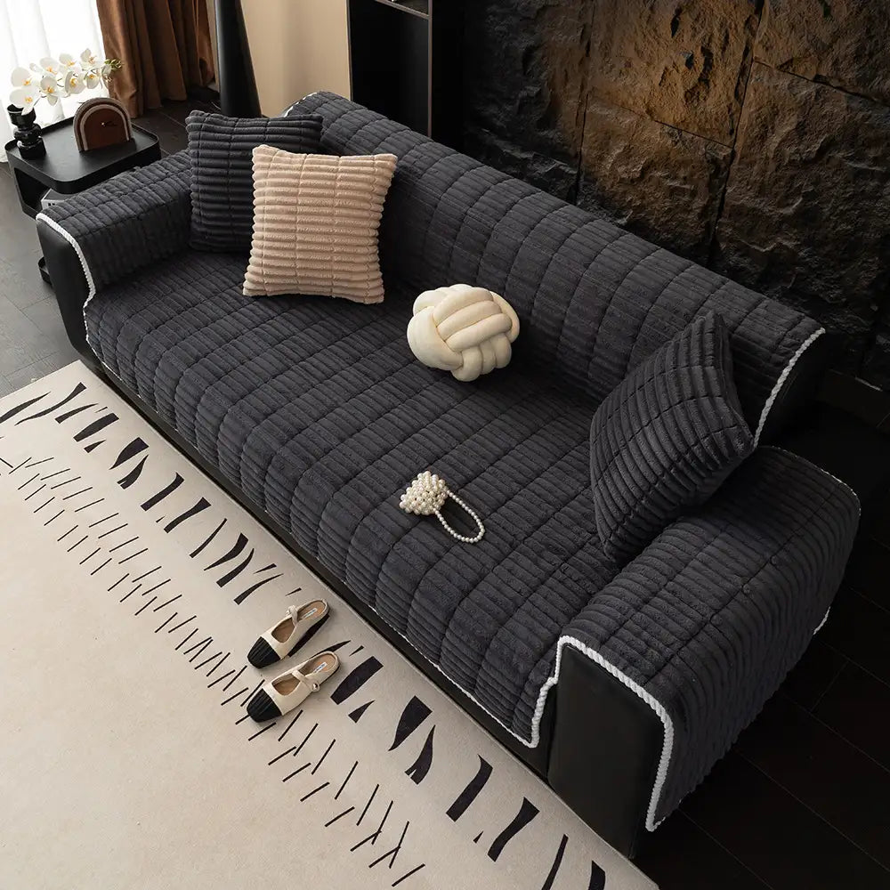 Functional flannel furniture cover, specifically designed for pet-friendly living rooms.