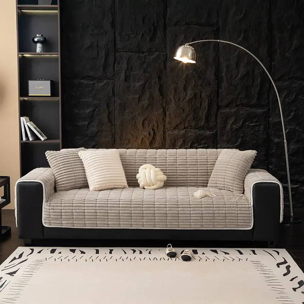 Comfortable flannel couch cover, enhancing living room aesthetics and durability.