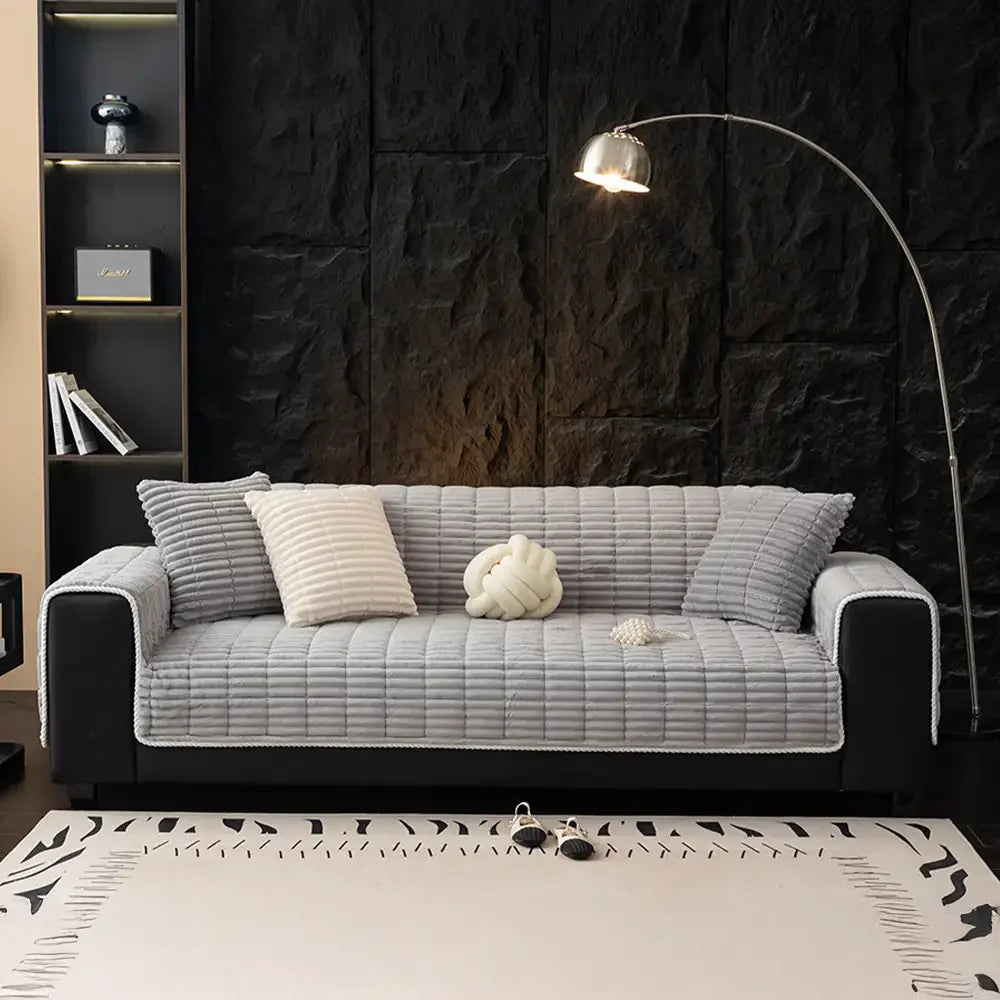 Versatile flannel sofa protector, making furniture maintenance simple for pet parents.