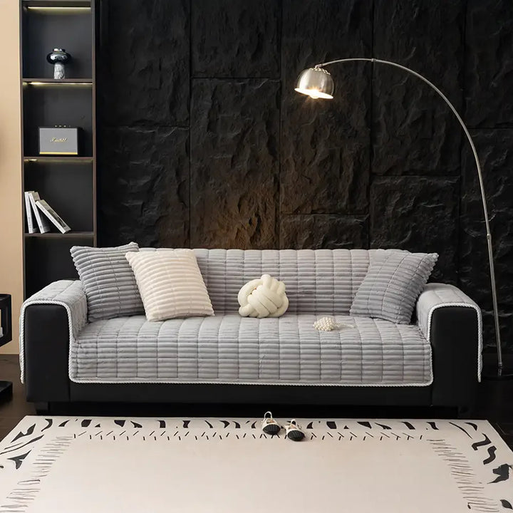 Versatile flannel sofa protector, making furniture maintenance simple for pet parents.