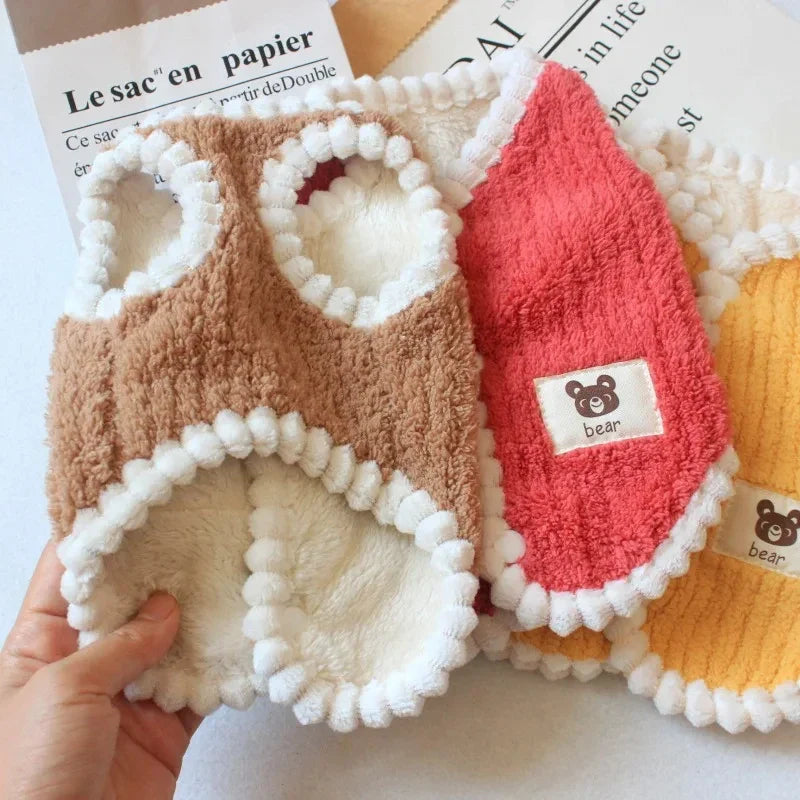 Small dog's winter ensemble: fleece pet coat, warm and stylish pet fashion
