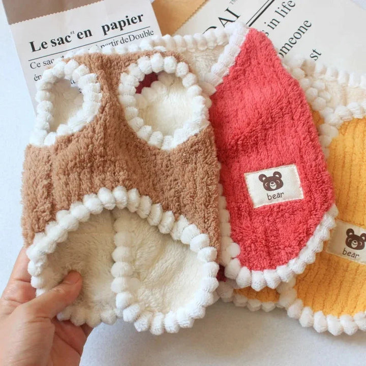 Small dog's winter ensemble: fleece pet coat, warm and stylish pet fashion