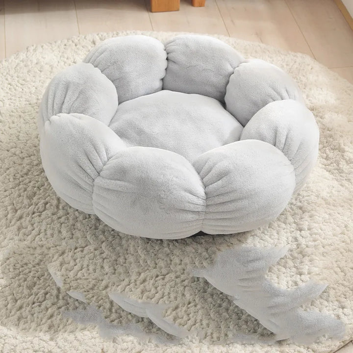 Adorable cat bed resembling a flower basket, offering a plush and warm sleeping cave for pets.