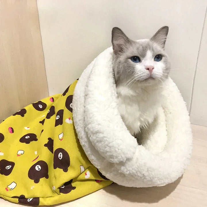 Cozy gray cat sleeping bag and play tunnel, perfect for a cozy pet retreat and active play.