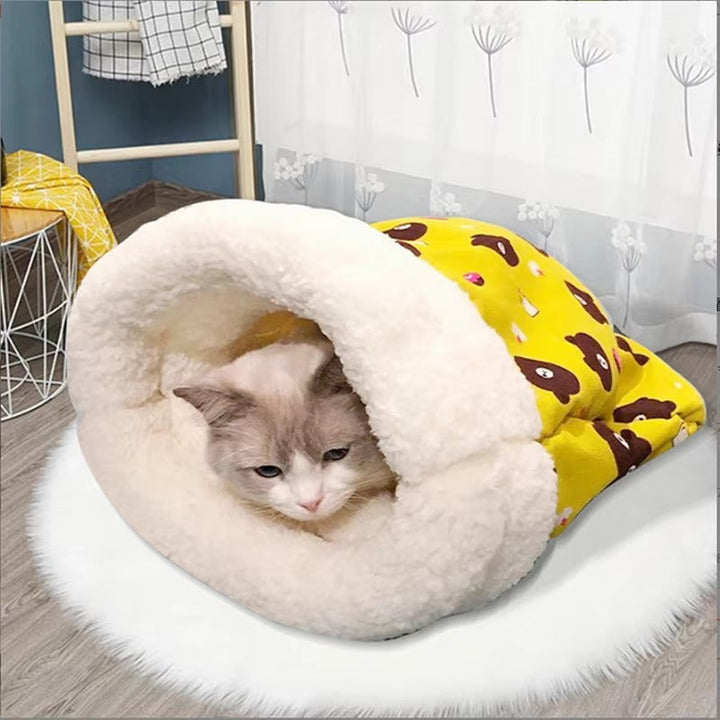 Unisex cat bed and tunnel combo, featuring an enclosed sleeping bag for ultimate feline comfort.