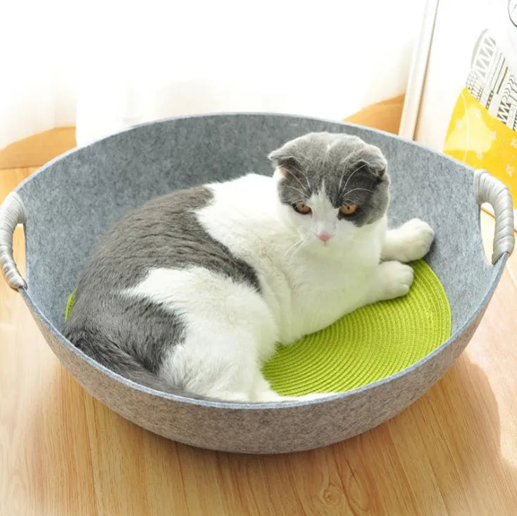 Cozy light grey felt cat bed with sturdy handles, designed for feline comfort and easy portability.