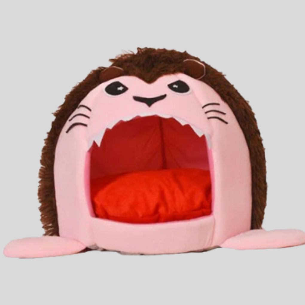 Small pet furniture: a cozy cat cave bed with a soft cushion, providing a secure and warm spot for your cat.