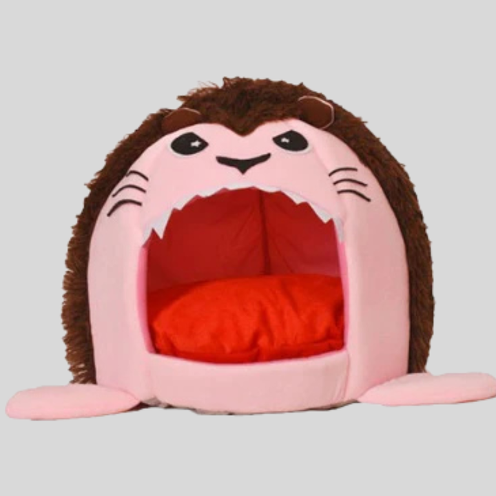 Small pet furniture: a cozy cat cave bed with a soft cushion, providing a secure and warm spot for your cat.