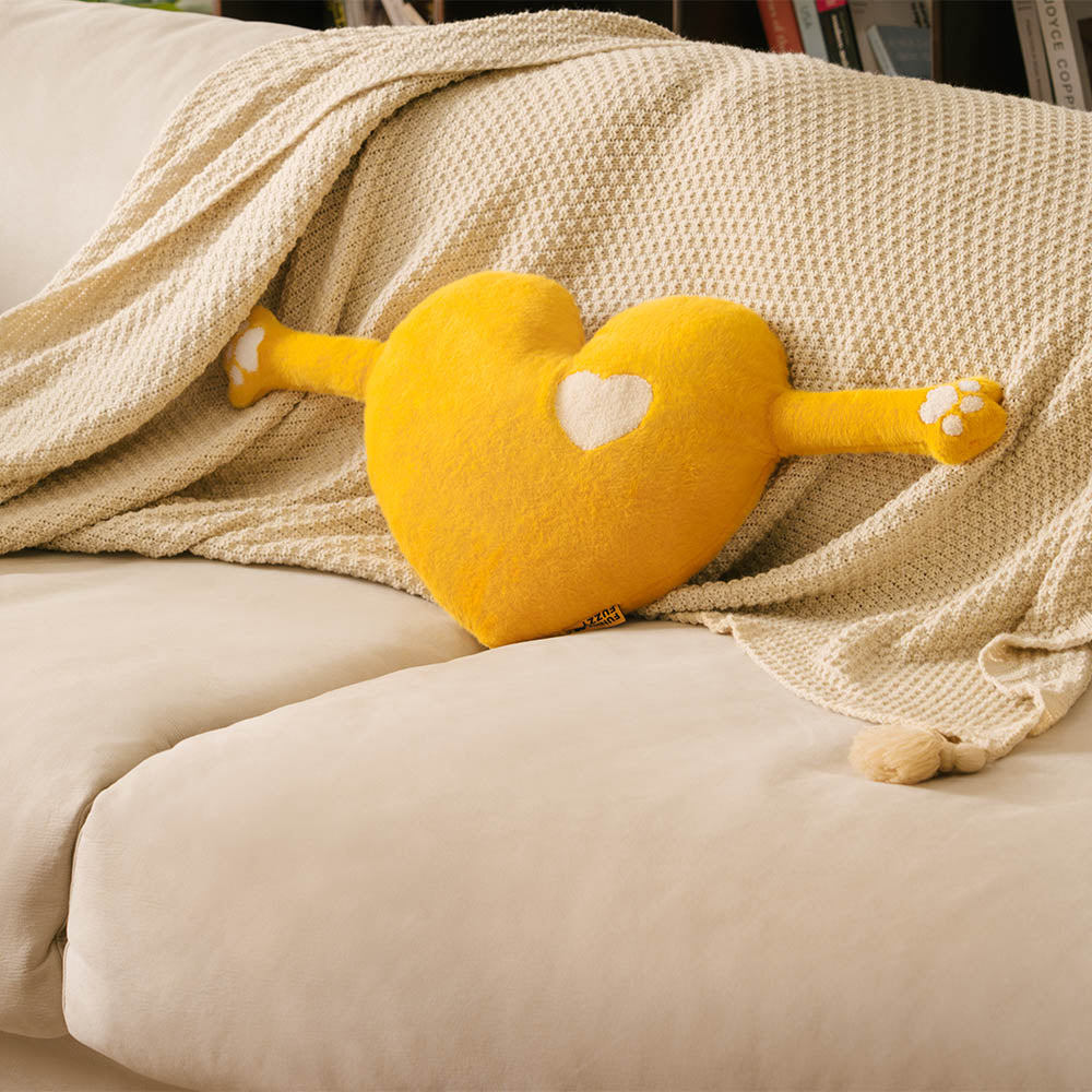 Plush heart pillow in a vibrant red, ideal as a cozy home decor comfort item