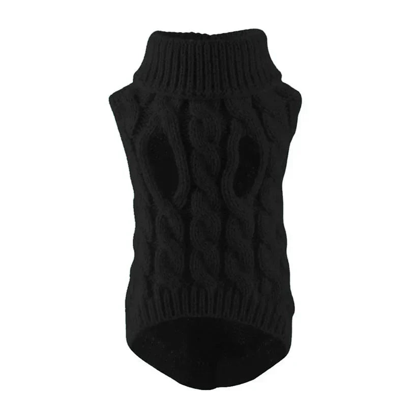 Red knitted dog sweater, folded neatly, highlighting the soft acrylic material and turtleneck design.
