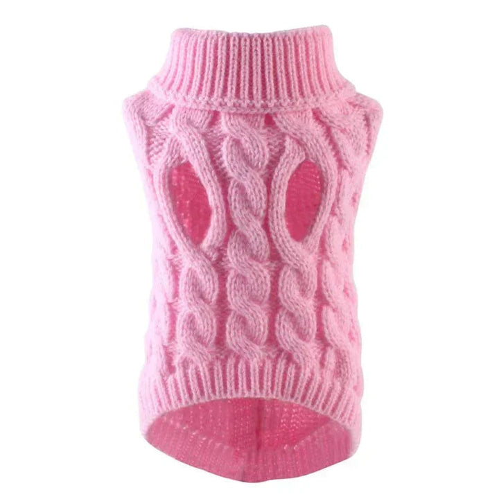 Cozy knitted dog sweater in pink, featuring a high-neck for extra warmth, essential pet clothing.