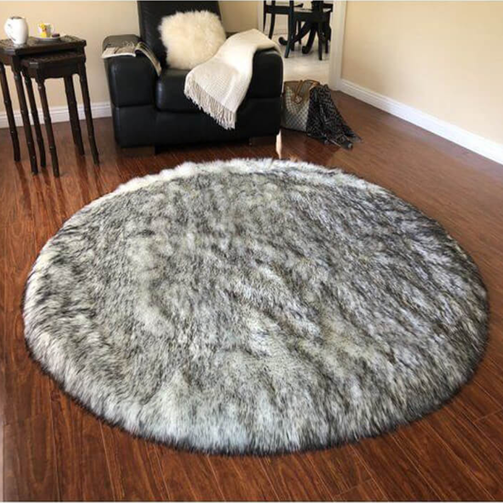 Contemporary long pile faux sheepskin rug, designed to be soft and durable for high traffic areas