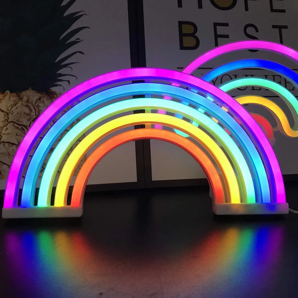 Portable rainbow LED table lamp, USB/battery. Enhances kids room decor & bedroom lighting with a vibrant glow.