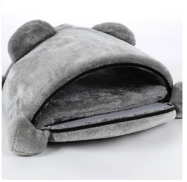 Enclosed cat cave shaped like a mouse, providing a secure and cozy sleeping area for cats