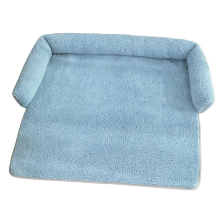Cozy non-slip dog blanket with integrated neck pillow for ultimate pet comfort. Washable and durable for small to medium dogs.