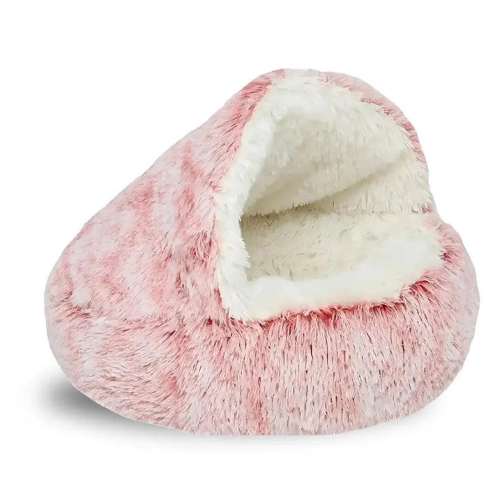 Soft small pet cave bed with orthopedic support, ideal for cats and small dogs relaxation.