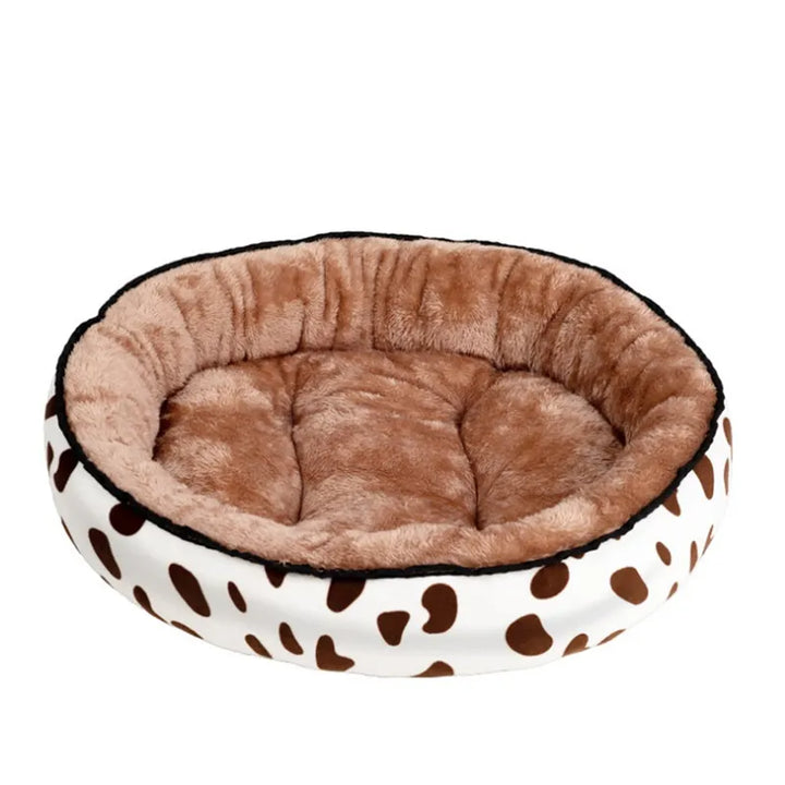 Pet accessories: round soft pet bed in a neutral tone, ideal for dogs and cats